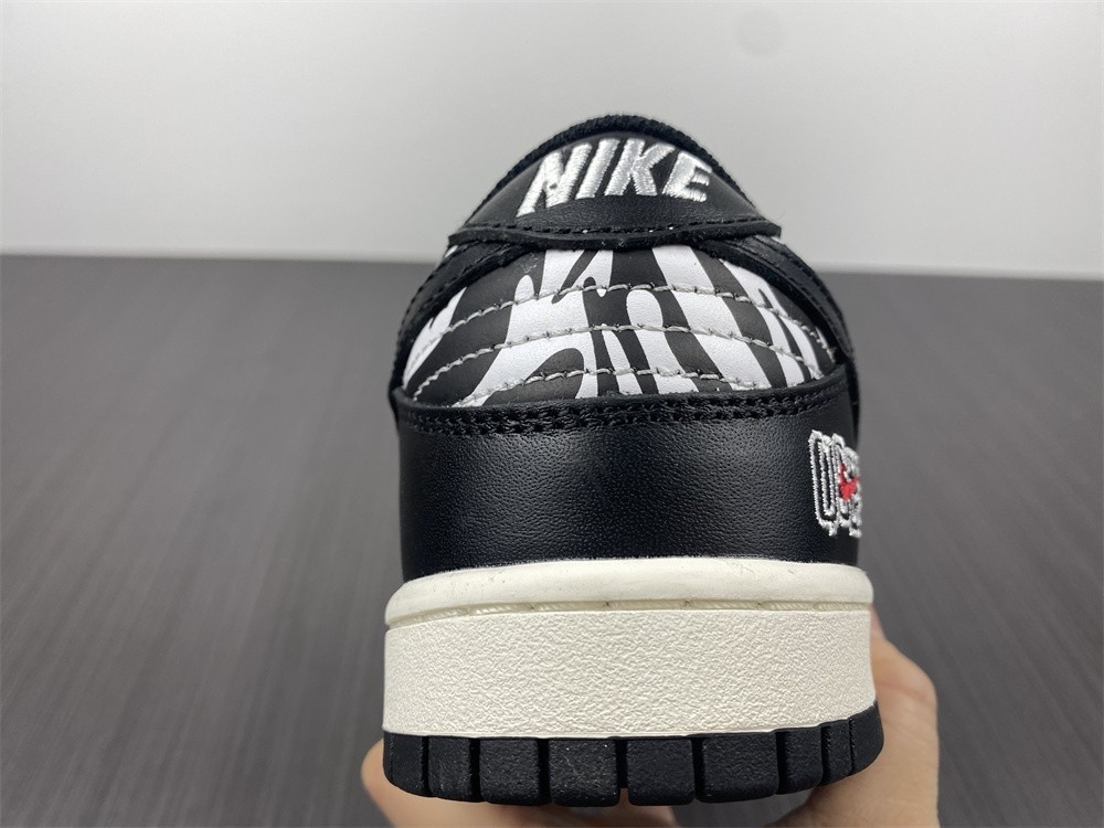 Quartersnacks x Nike SB Dunk Low Zebra DM3510-001