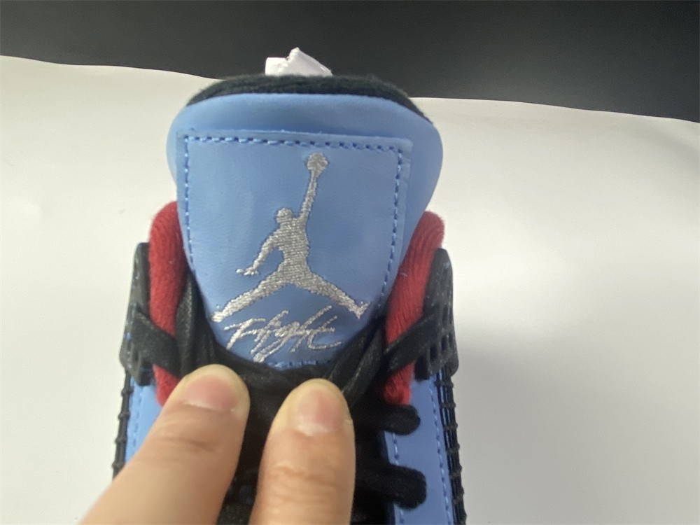 Travis Scott x Air Jordan 4 “Houston Oilers” University Blue 308497-406