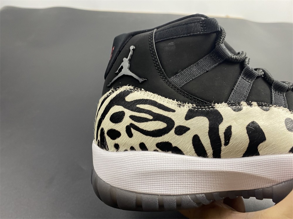 Air Jordan 11 “Animal Instinct” Black / Red / Sail / White AR0715-010