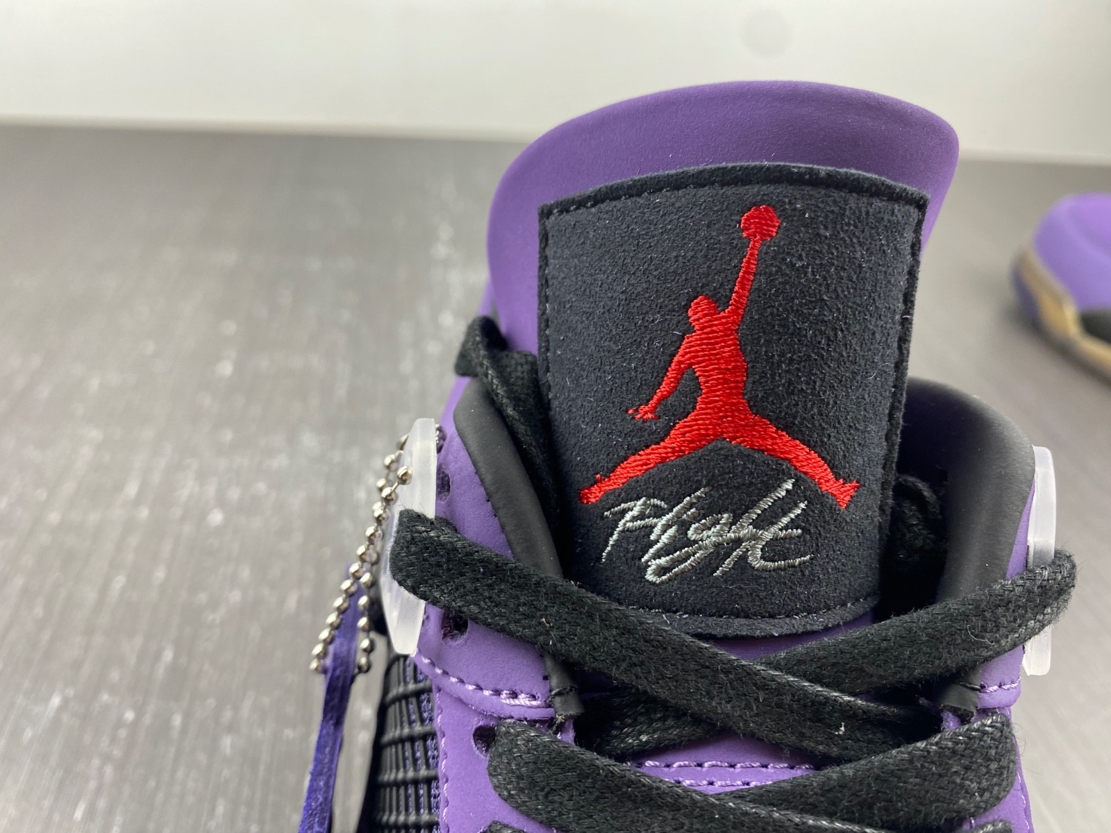TRAVIS SCOTT X AIR JORDAN 4 IN PURPLE