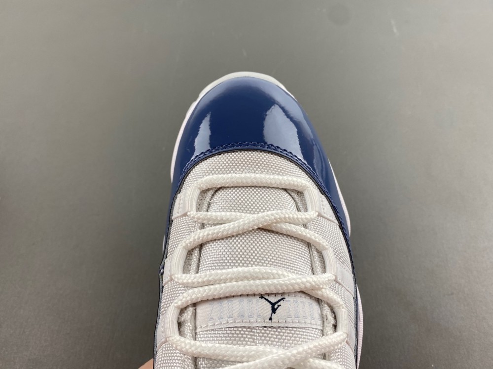 AIR JORDAN 11 LOW “DIFFUSED BLUE” FV5104-104