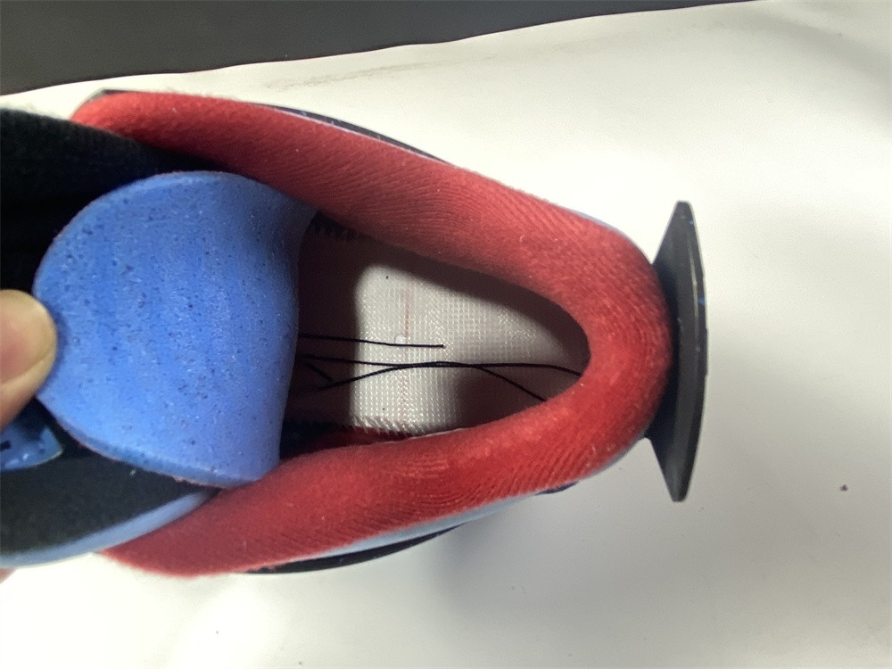 Travis Scott x Air Jordan 4 “Houston Oilers” University Blue 308497-406